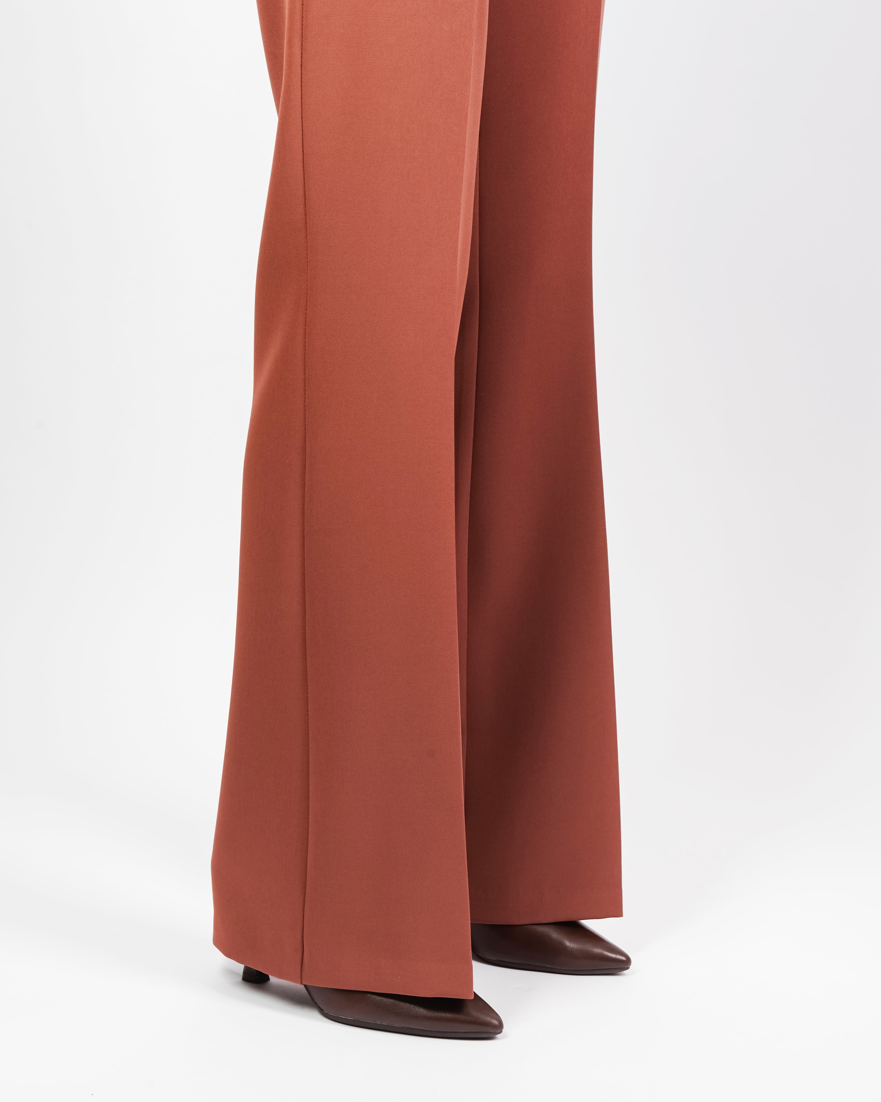 Pantalone con fibbie oro tecnico TISANA