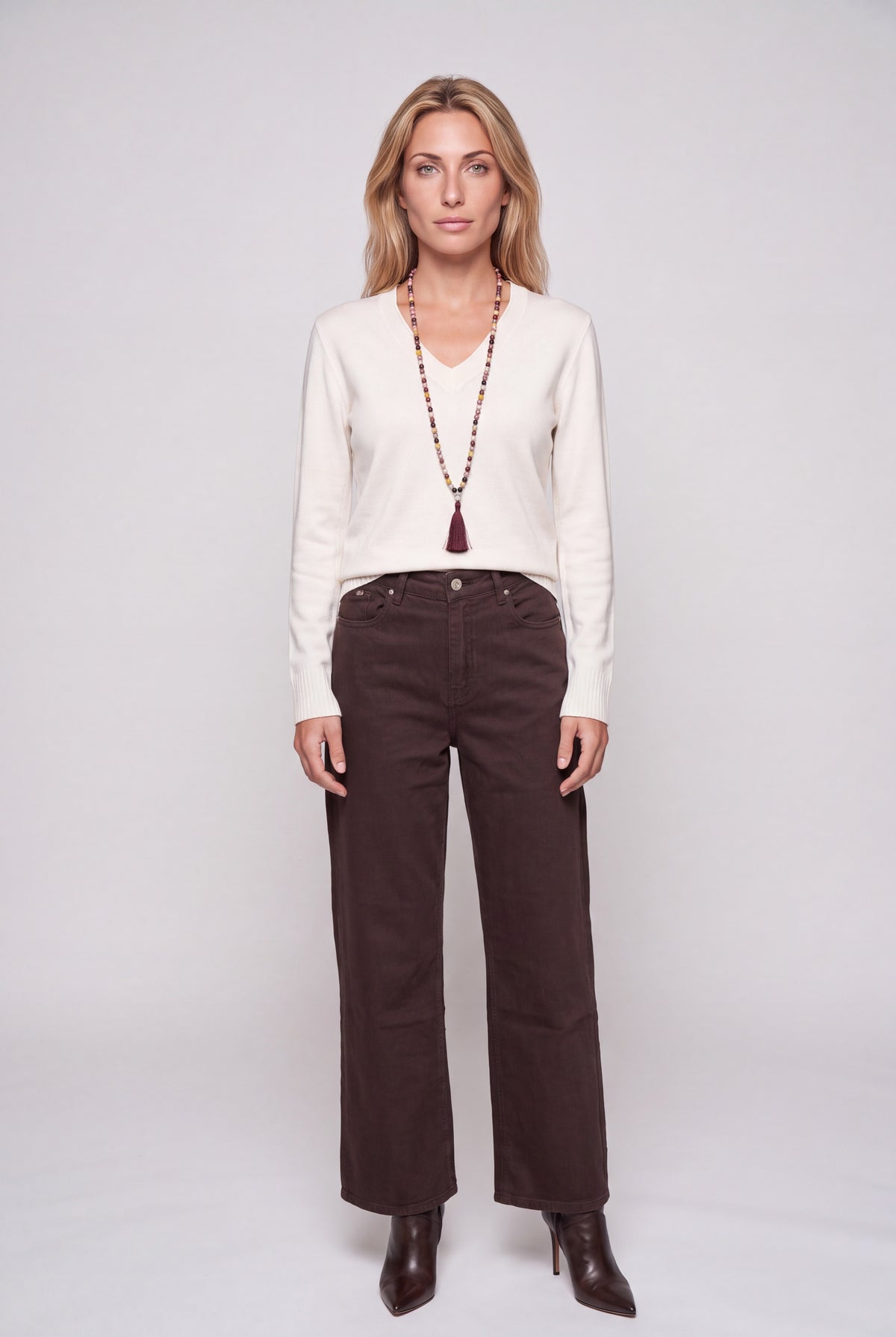 Maglia pura lana scollo a V arancione da donna, maniche lunghe e orlo a costine
