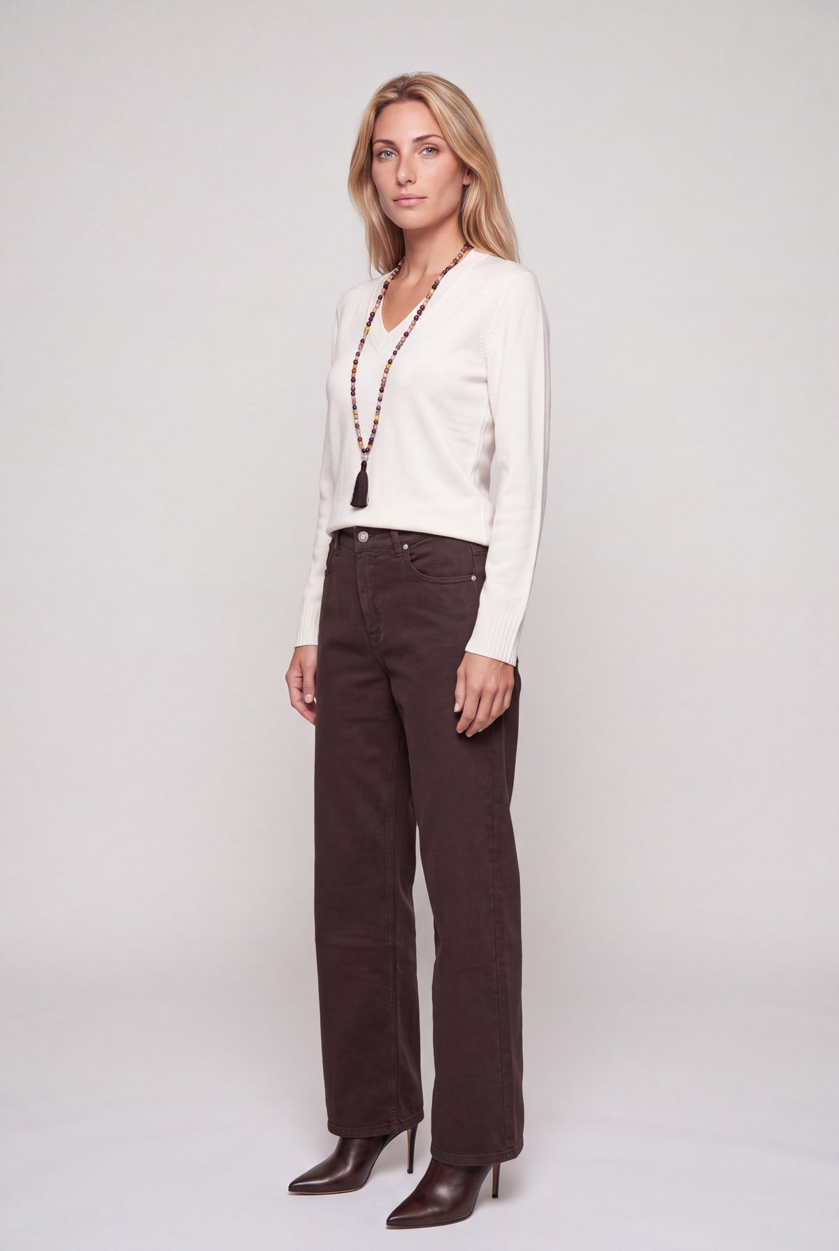 Maglia pura lana scollo a V arancione da donna, maniche lunghe e orlo a costine