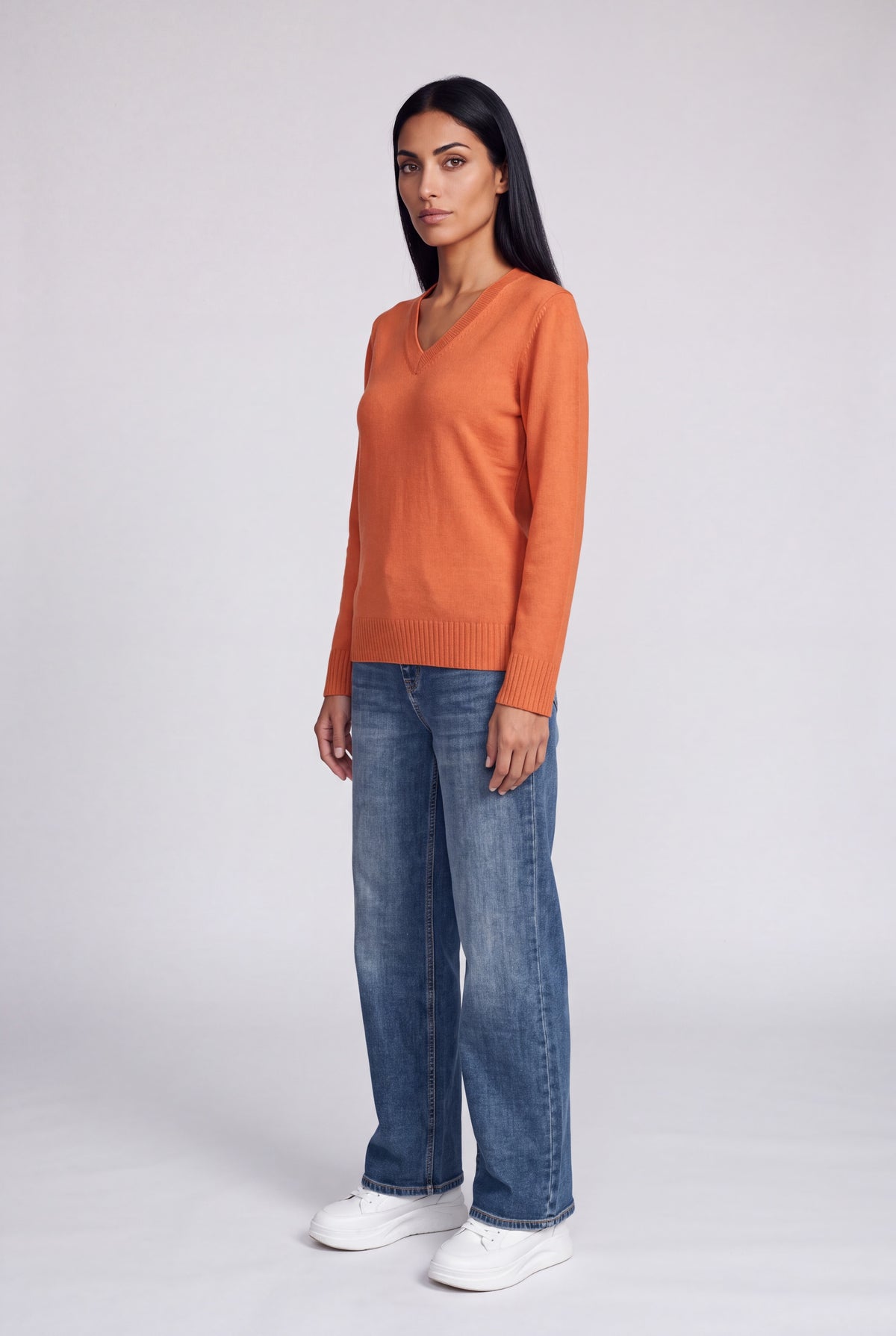 Maglia pura lana scollo a V arancione da donna, maniche lunghe e orlo a costine